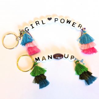 A set of two handmade keychains with tassles.