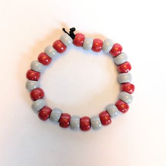 A scarlet red and gray bread bracelet