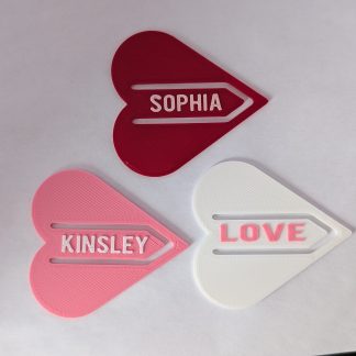Heart shaped bookmarks with custom text available.