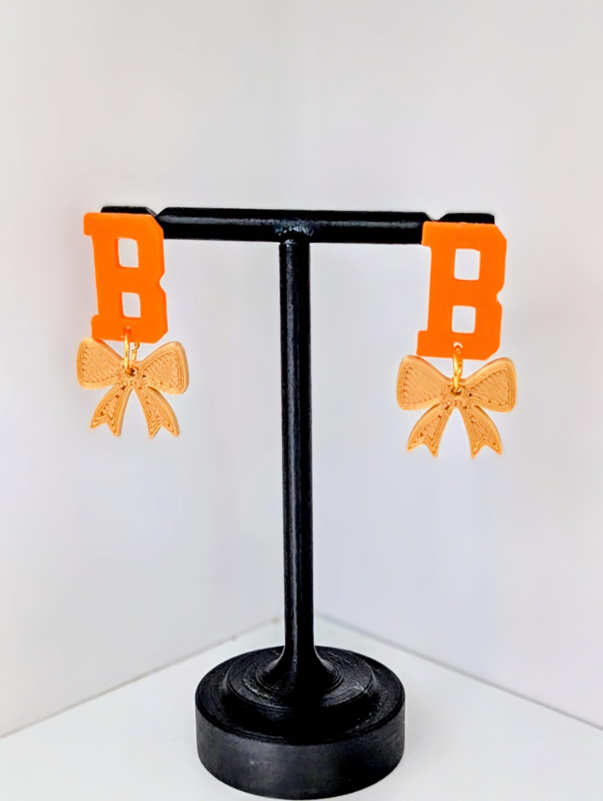 B with Bow Earrings available with either a pink or gold bow