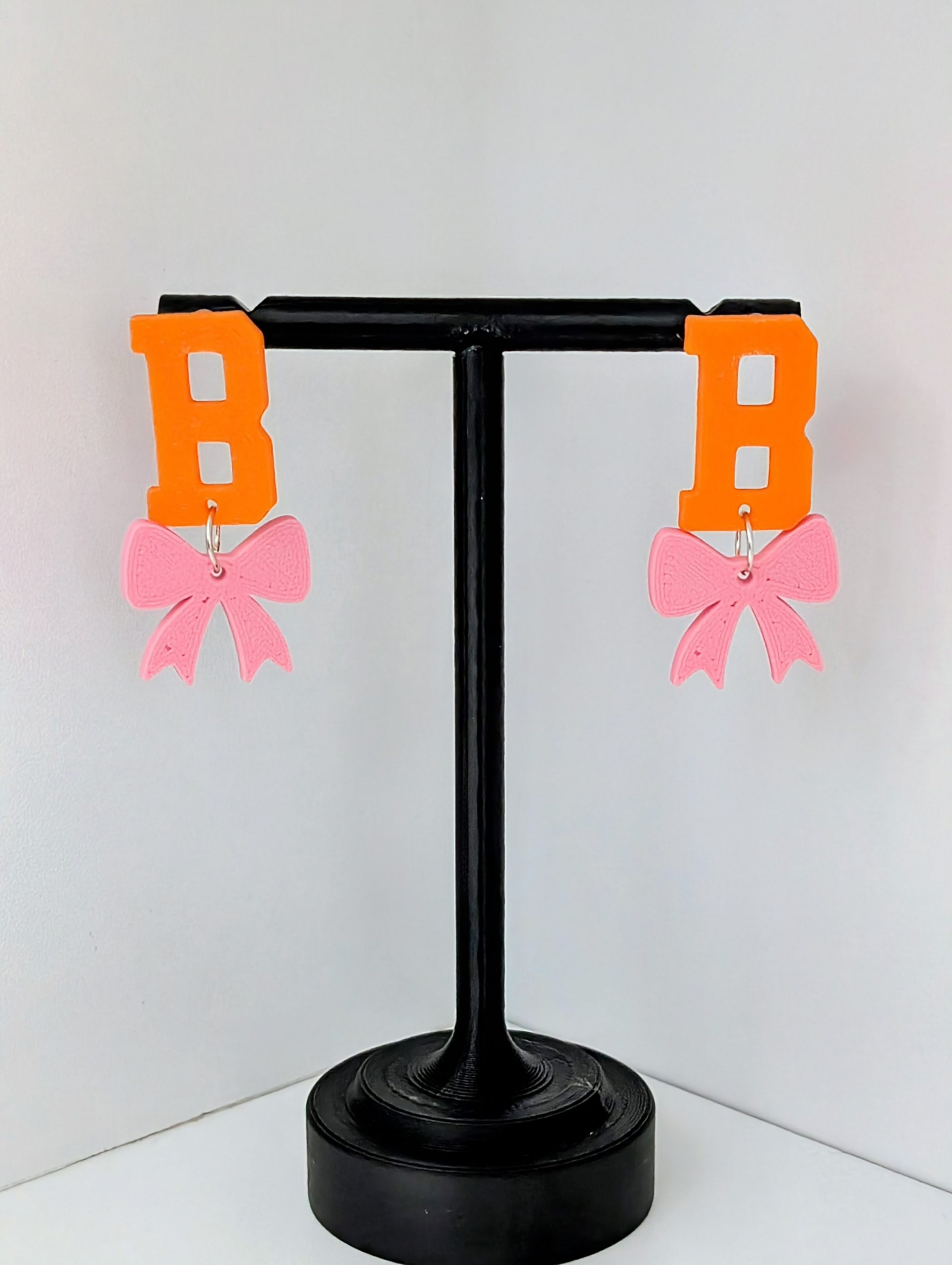 B with Bow Earrings available with either a pink or gold bow